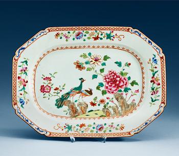 1572. A famille rose 'double peacock' serving dish, Qing dynasty, Qianlong (1736-95).