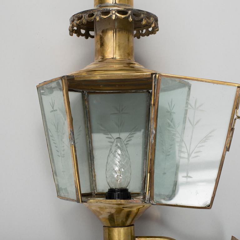 A pair of brass coach carriage lamps, around the turn of the century 1900.