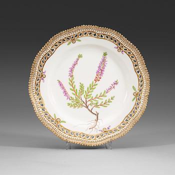 1804. A set of 18 Royal Copenhagen 'Flora Danica' dishes, Denmark, 20th Century.