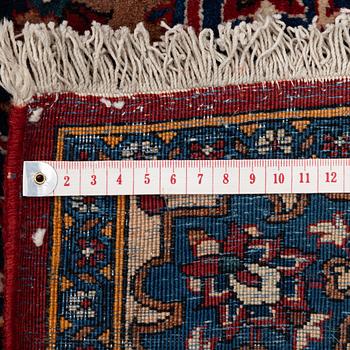 A semi-antique Isfahan carpet, Central Iran, c. 432 x 319 cm.