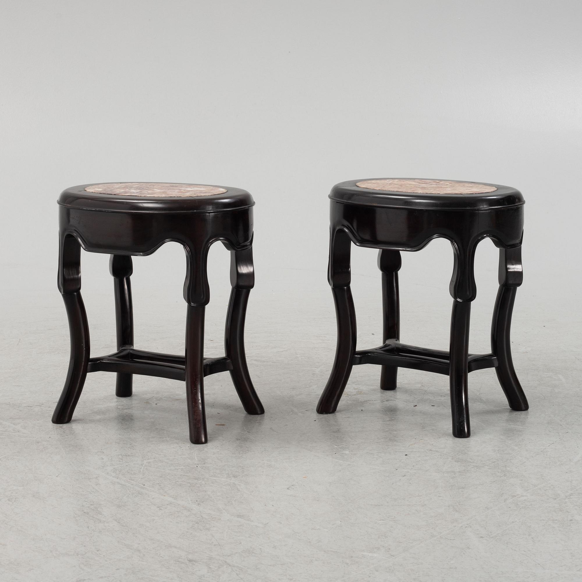 A pair of black-lacquered stools, Japan, around 1900.