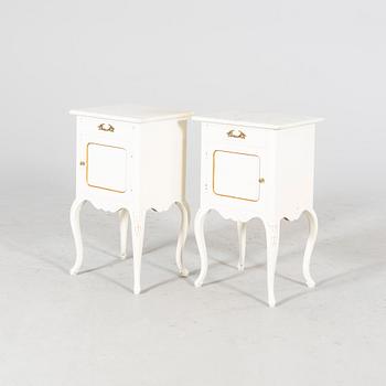 A pair of painted Rococo style bedside tables mid 1900s.