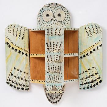 Gérard Rigot, a painted and carved oak wall cabinet, exectued in his studio, France, second half of the 20th century.