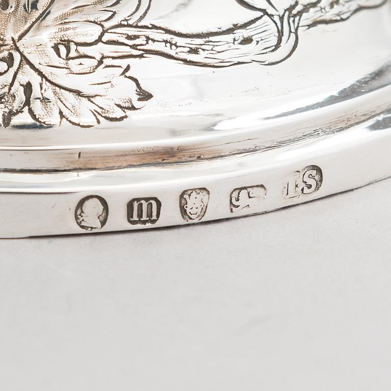 A George III sterling silver ewer by John Scofield, London, 1787.