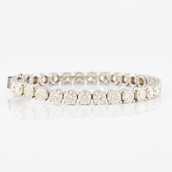 Tennis bracelet, 18K white gold with brilliant-cut diamonds.