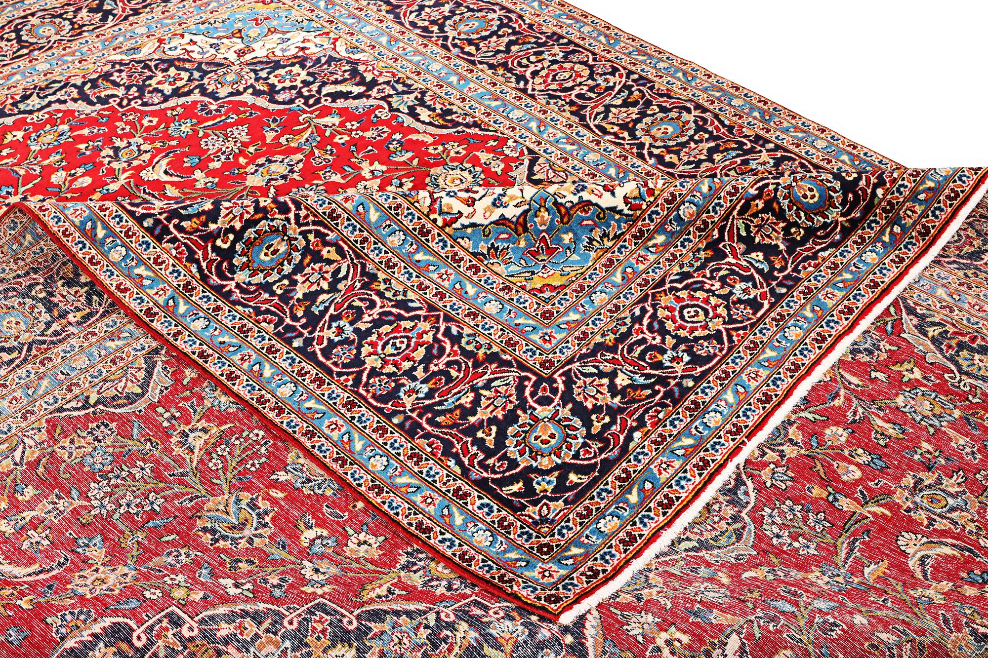 A Kashan carpet, c. 412 x 300 cm.