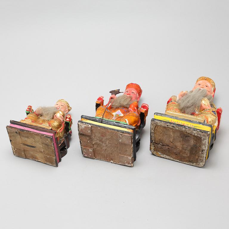 A set of three wooden deities, China, early 20th Century.