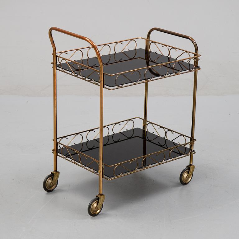 A brass and glass serving trolley, later part of the 20th Century.