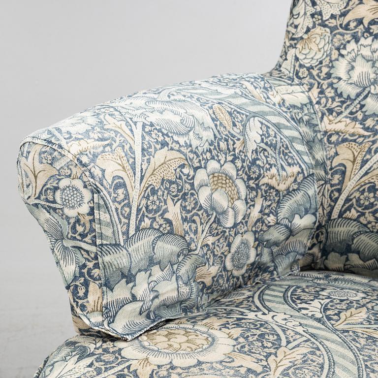 Carl Malmsten, a pair of Hemmakväll easy chairs .