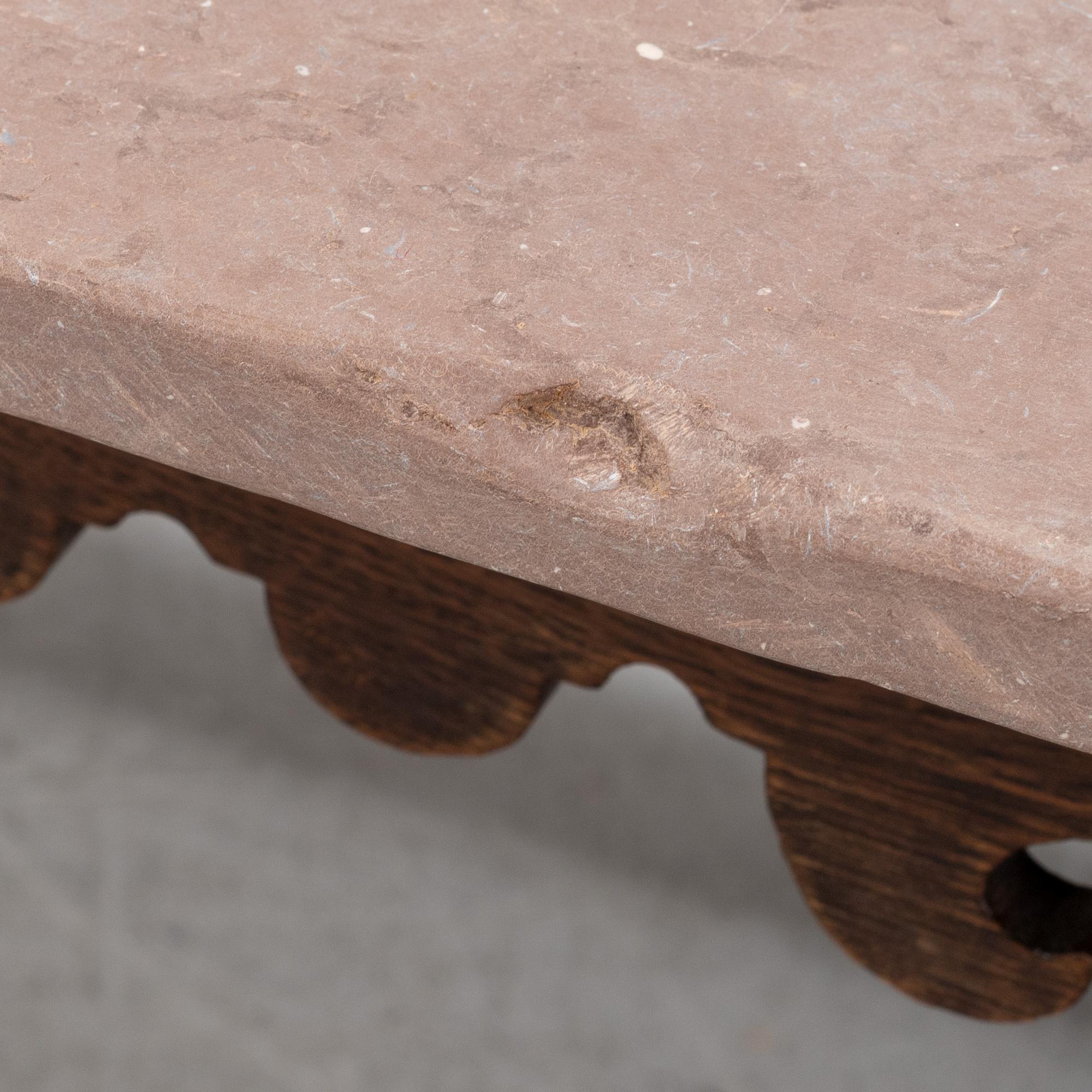 A Baroque oak and stone top table, 18th Century.