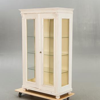 A painted display cabinet first half of the 20th century.