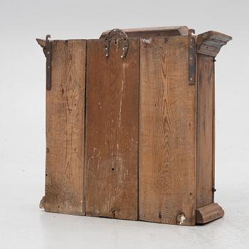 A 18th century wall vitrine cabinet.
