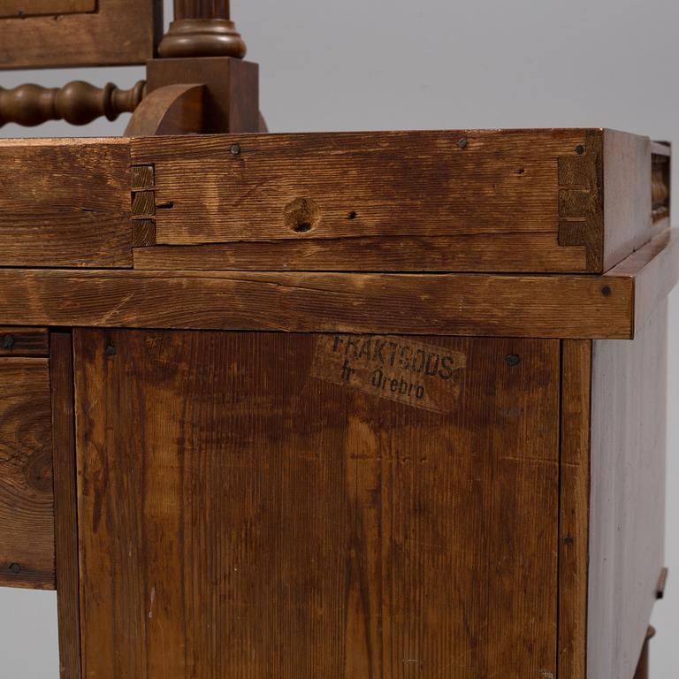 A  mahogany empire dressing 19th century table with mirror.