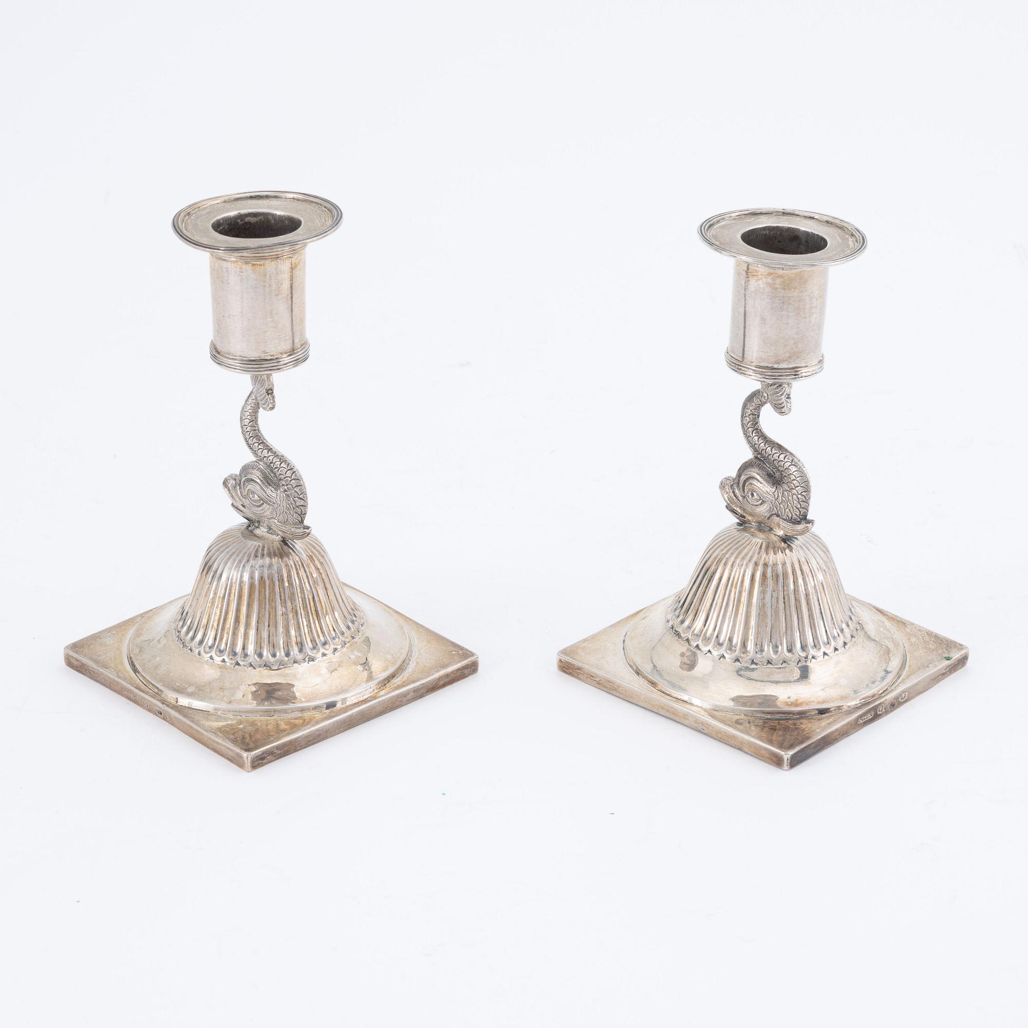 A pair of silver candle sticks by CM Ryberg Stockholm, 1815.
