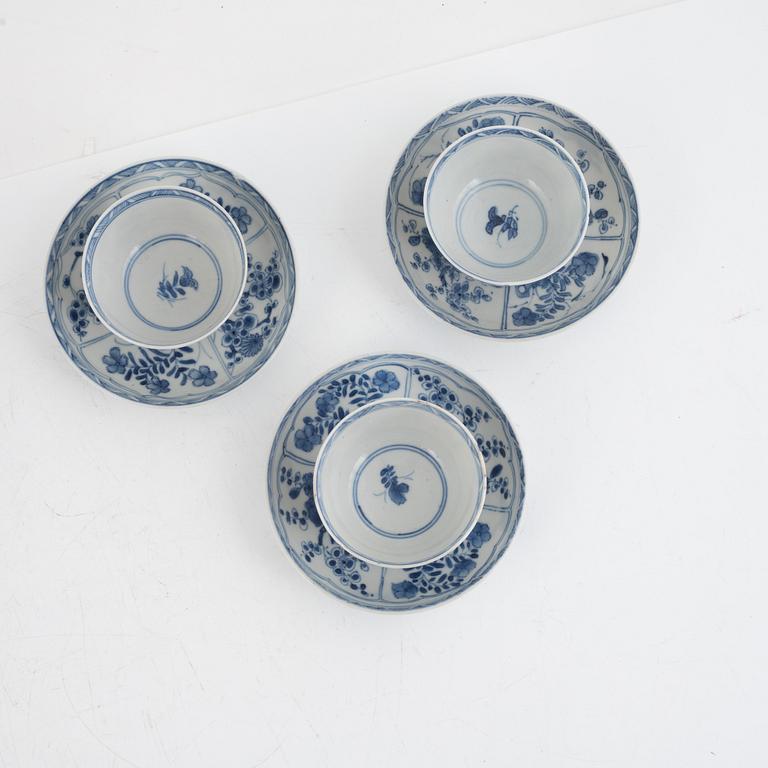 Three Kangxi cups with saucers and five Qianlong cups with saucers, China, 18th century.