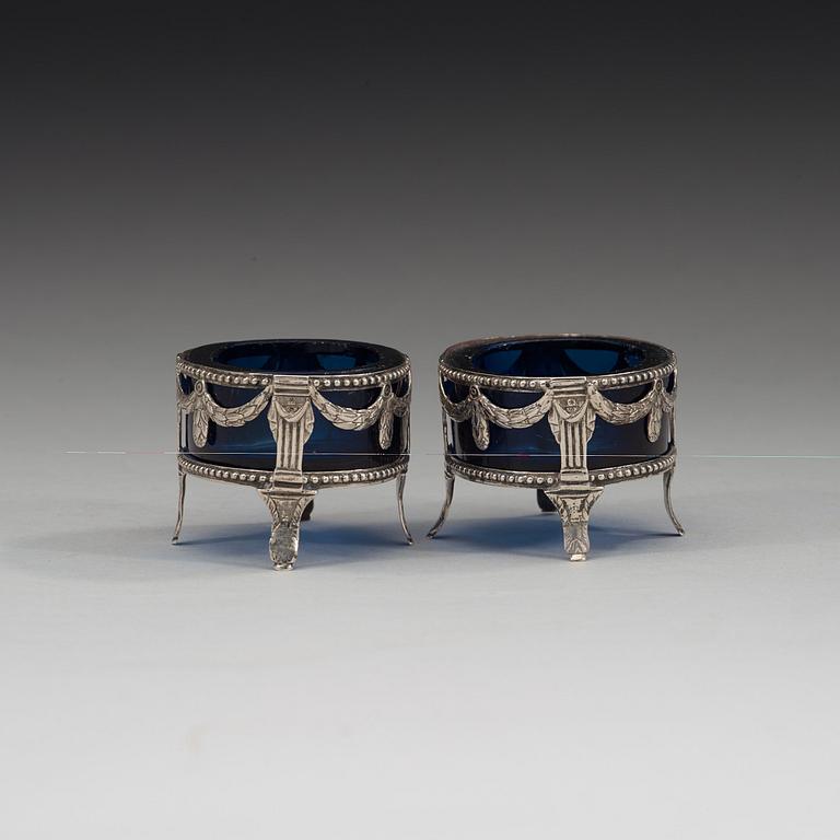 A pair of Swedish 18th century silver and blue-glass salts, marks of Nils Tornberg, Linköping 1792.