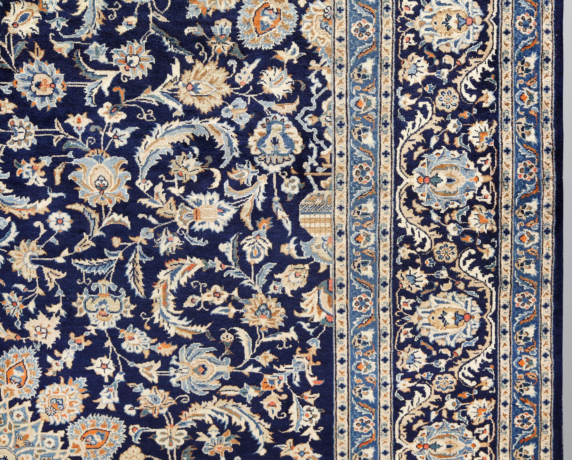 A Kashmar carpet, ca 340 x 253 cm.