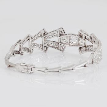 A BRACELET set with round brilliant-cut diamonds.