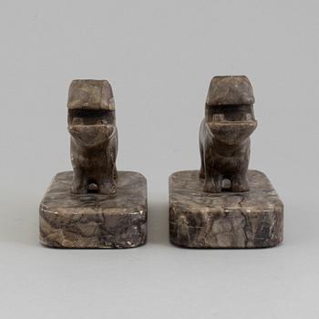 A pair of stone book ends, early 20th century.