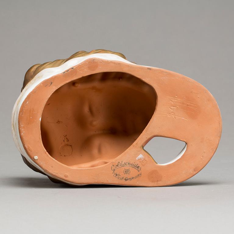An Adolf Prischl terracotta wall mask for Goldscheider, mid 1900.