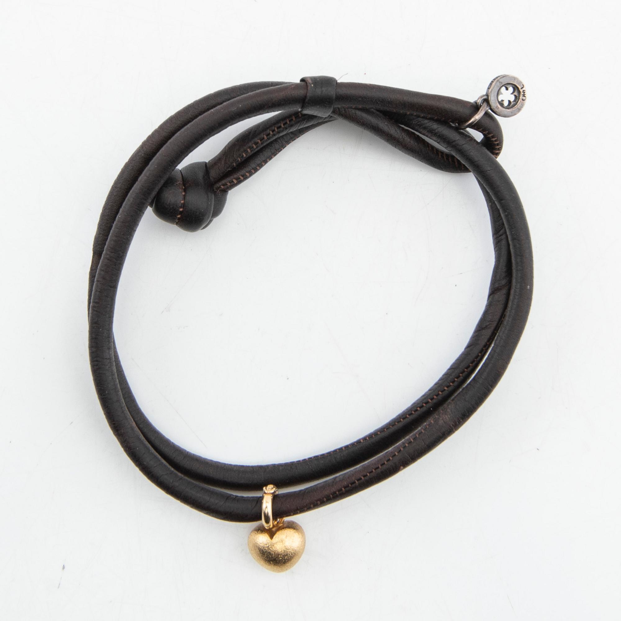 Ole Lynggaard, bracelet in leather with charm in 18k gold, "Sweet drops".