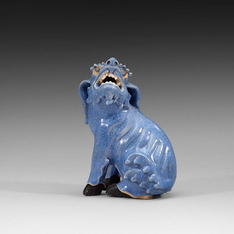 A blue glazed figure of a buddhist lion, Qing dynasty, Qianlong (1736-95).