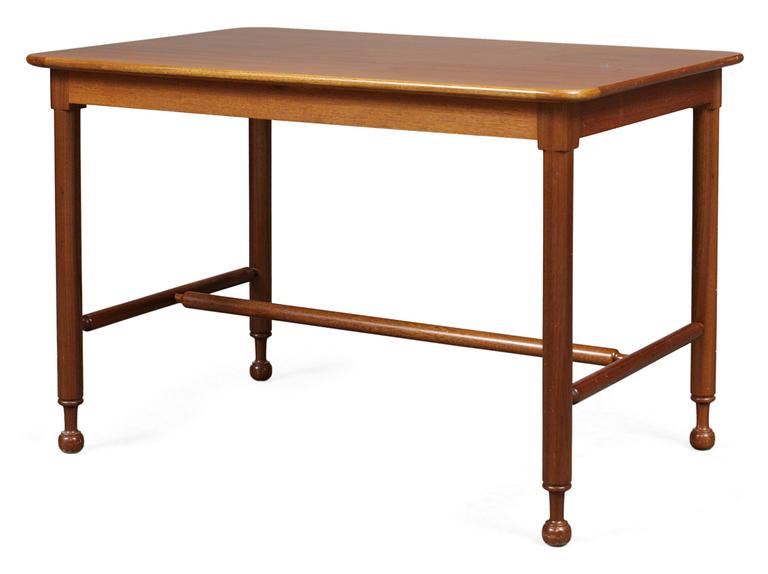 A Josef Frank mahogany table, Firma Svenskt Tenn, model 1104.