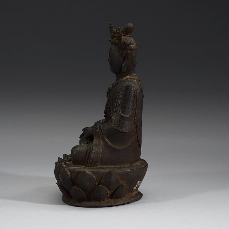 A bronze figure of Guanyin seated on a Lotus throne, Ming dynasty, 17th Century.