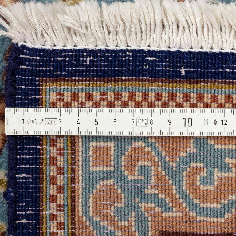 A Kerman carpet, circa 403 x 301 cm.