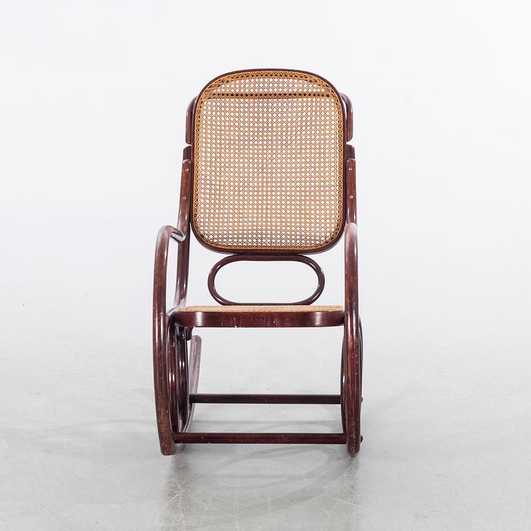 A first half of the 20th century rocking chair.