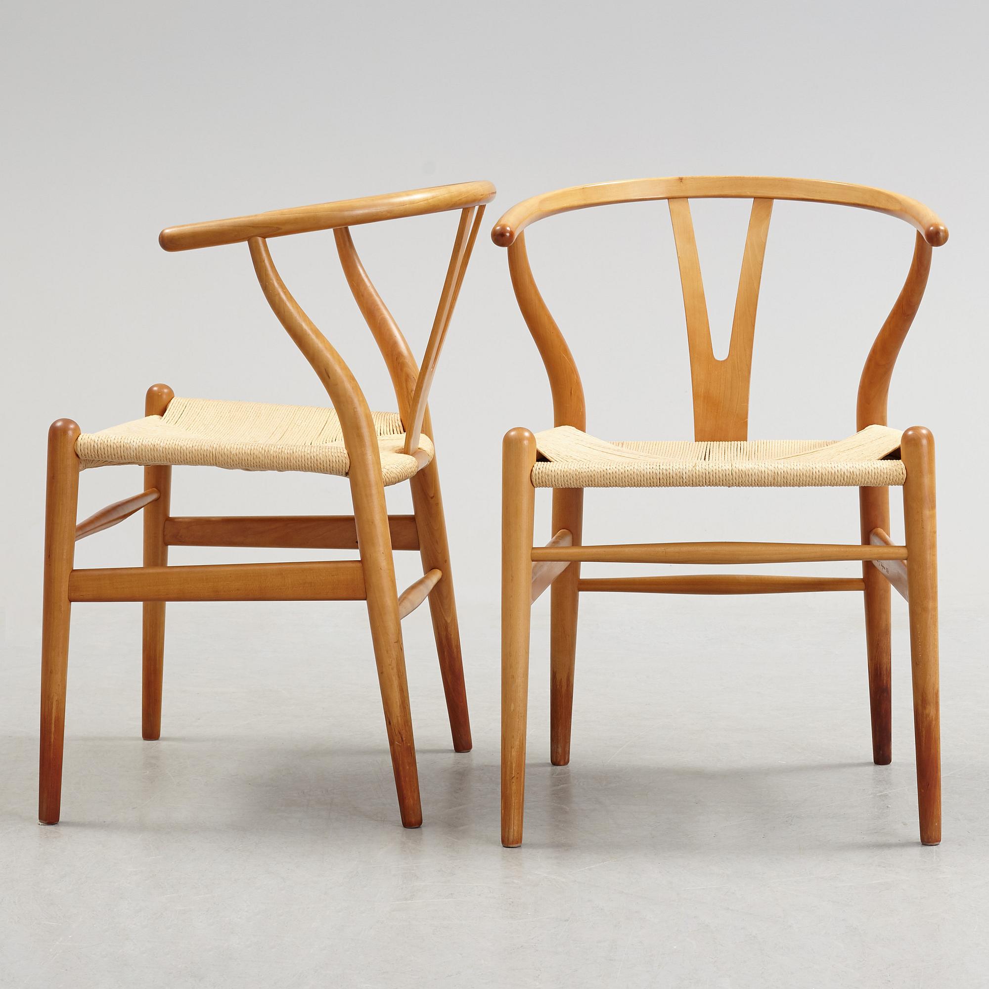 A set of four + two armchairs 'Y-chair' by Hans J Wegner, Carl Hansen & Son, Denmark.