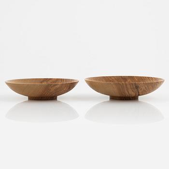 Magnus Ek, a set of eight ash wood plates for Oaxen Krog, 2021.