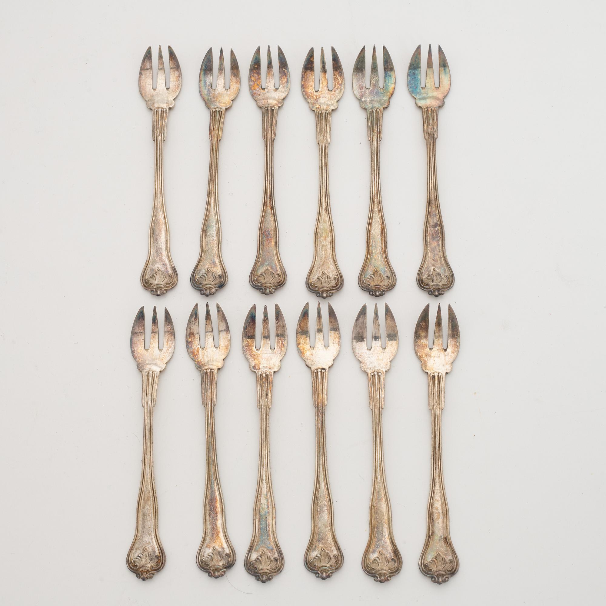 Ostrongafflar, 12 st, silver, Hippolyte Thomas, Paris, Frankrike (1845-55).