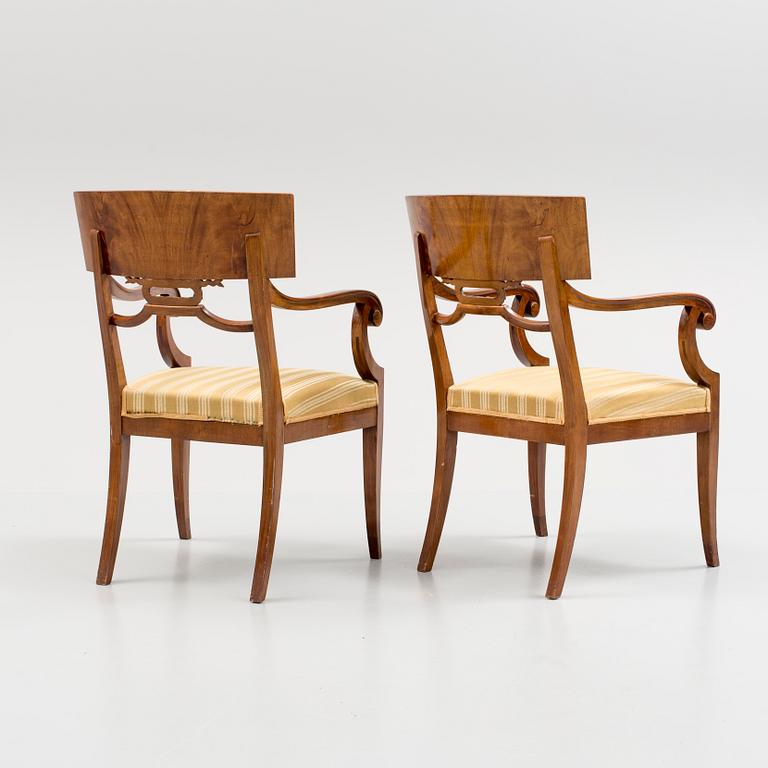 A pair of empire-style chairs by Myrstedt & Stern Stockholm, around 1900.