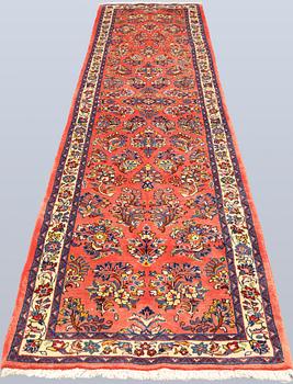 A Saruk runner carpet, 358 x 78 cm.