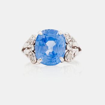 679. A circa 6.50 ct untreated sapphire (probably Ceylon) and single-cut diamond ring.