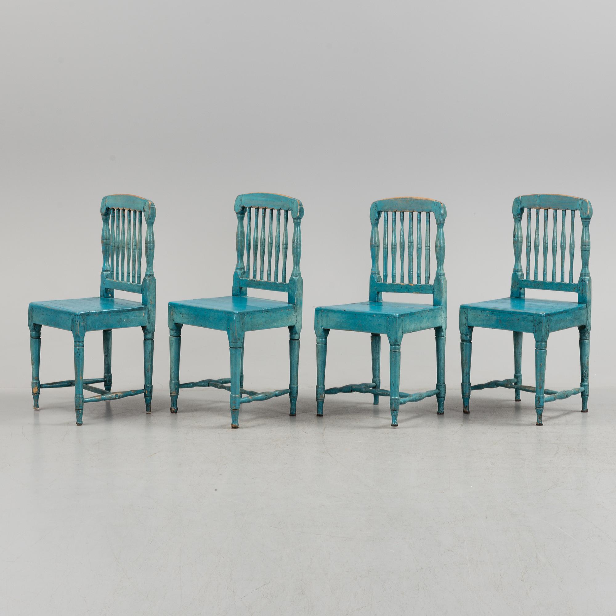 A set of four 19th century folk art chairs.