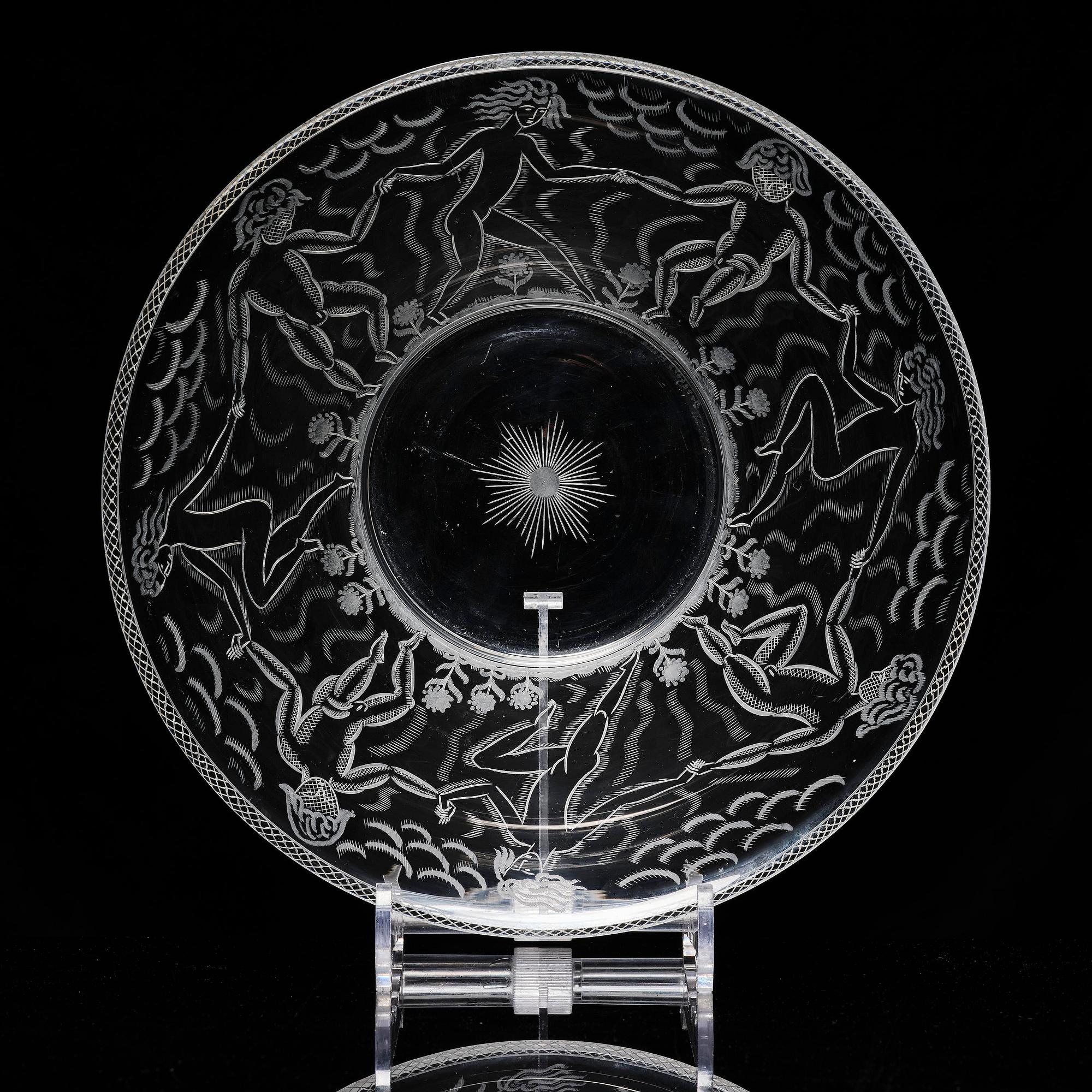 Edward Hald, an engraved glass bowl with plate, Orrefors, Sweden, 1926, model 305, engraved by Emil Goldmann.