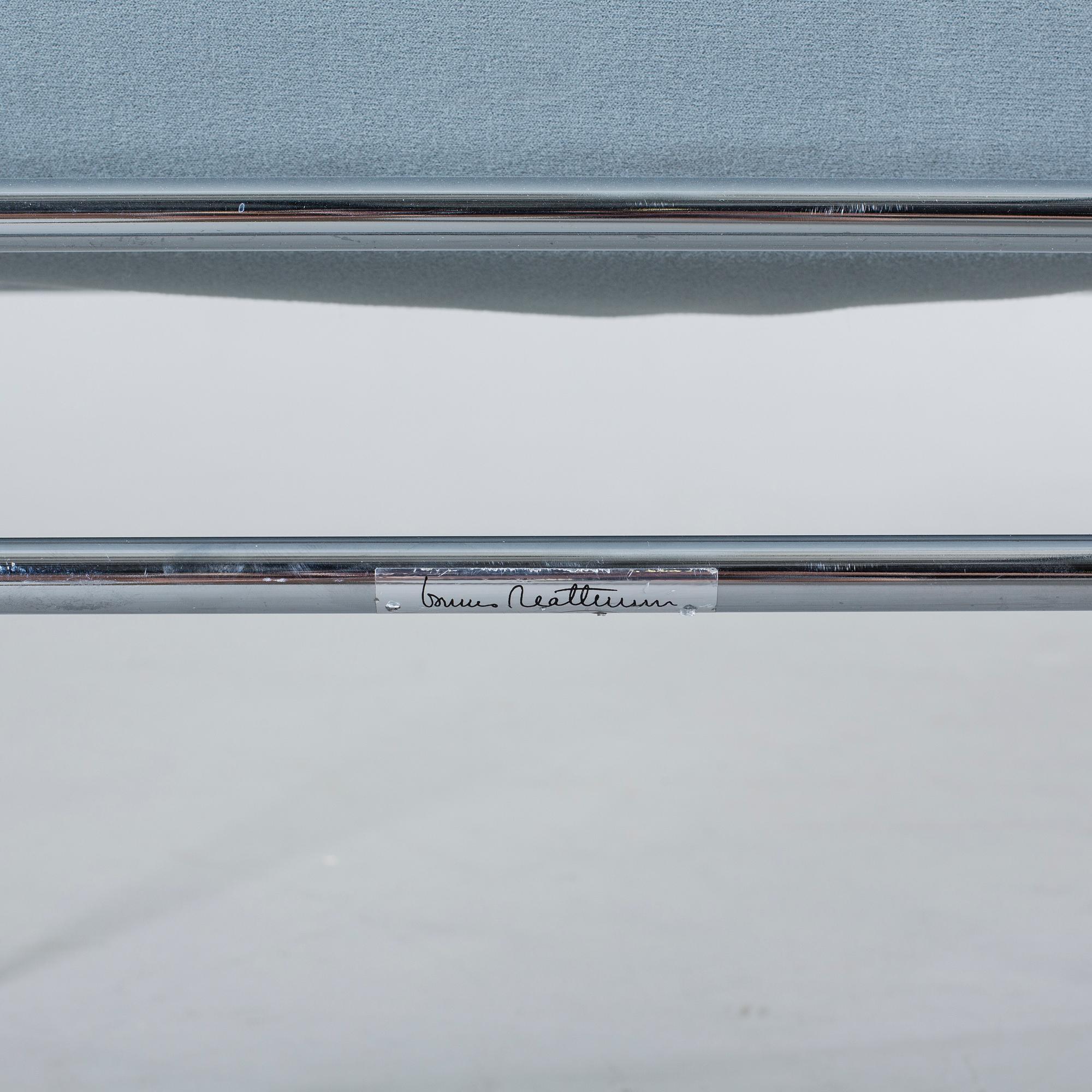 A COUPLE OF BRUNO MATHSSON ARMCHAIRS.