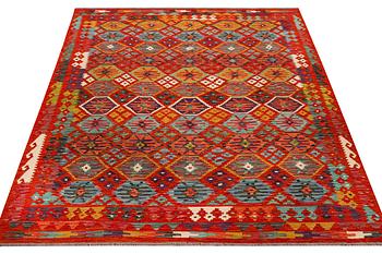 An Afghan kilim carpet, c. 257 x 202 cm.