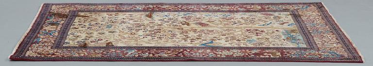 A RUG, a semi-antique Esfahan probably, figural, ca 214,5 x 137,5 cm.