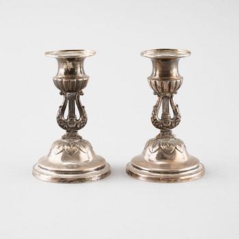 A pair of silver candelsticks by Daniel Eklund, Kalmar, empire, 1854, weight 163.