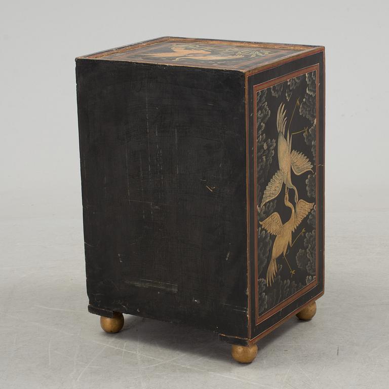 A 20th century oriental drawer.