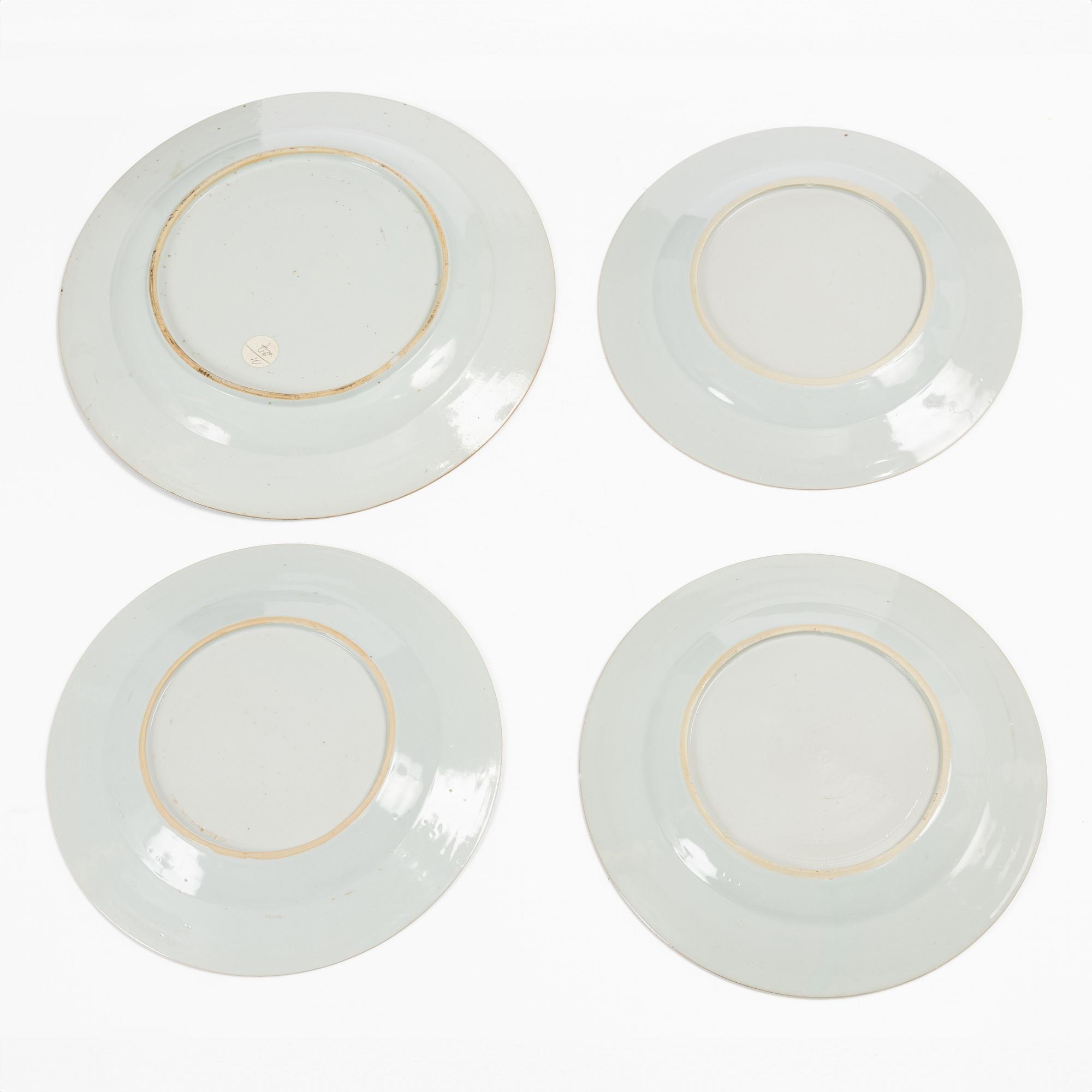 A set of one Chinese blue and white export porcelain dish and three plates, Qing dynasty, Qianlong (1736-95).