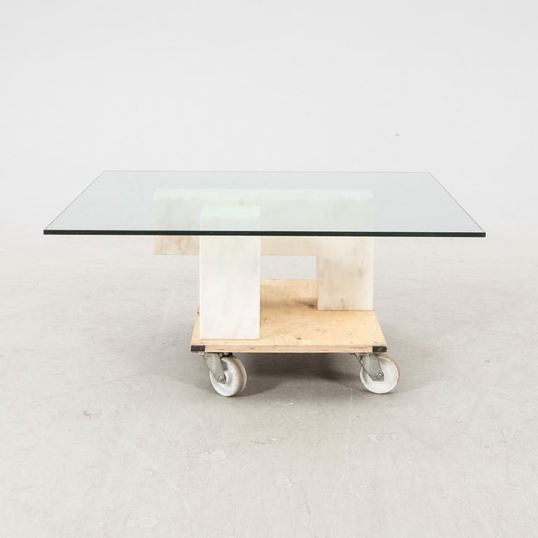A late 20th century/21st century marble and glass coffee table.