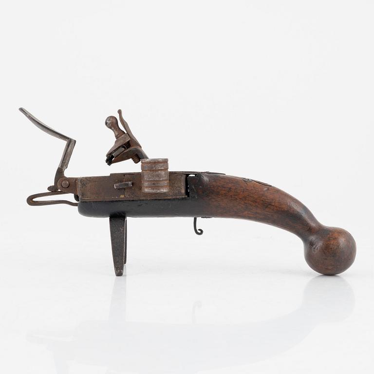 A 18th Century Flintlock lighter.