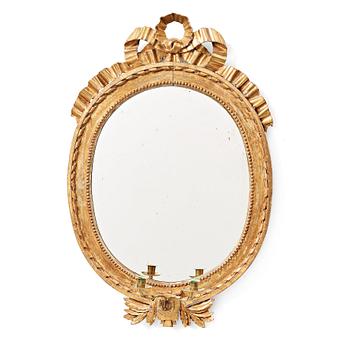 63. A Gustavian two-light girandole mirror.