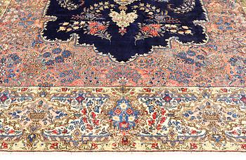 A semi-antique Kerman carpet, approximately 358 x 268 cm.