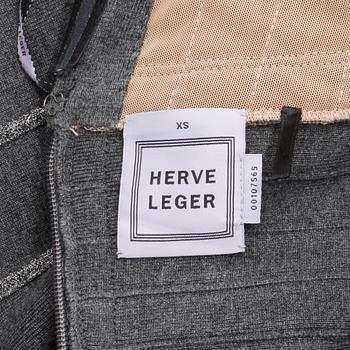HERVÉ LÉGER, a grey and silver bandage dress. Size XS.