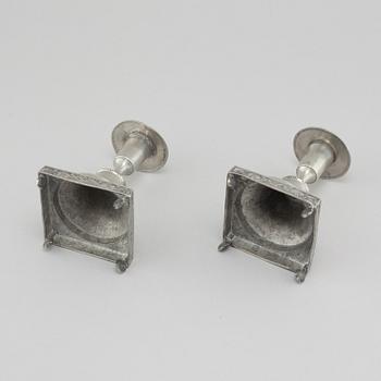 A pair of pewter candlesticks, probably by Gustaf Frederic Wigholm in Eskilstuna, first half of the 19th century.